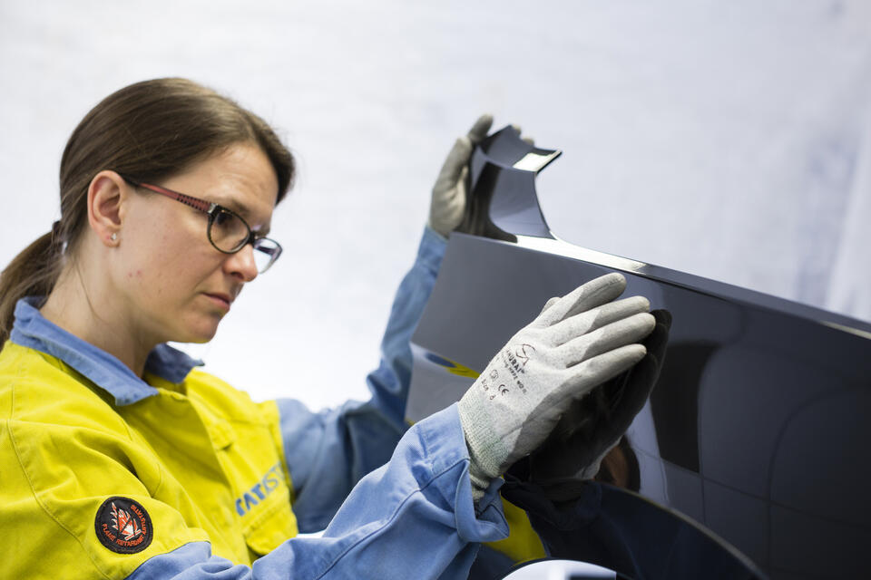 Body panel inspection by Tata Steel technician