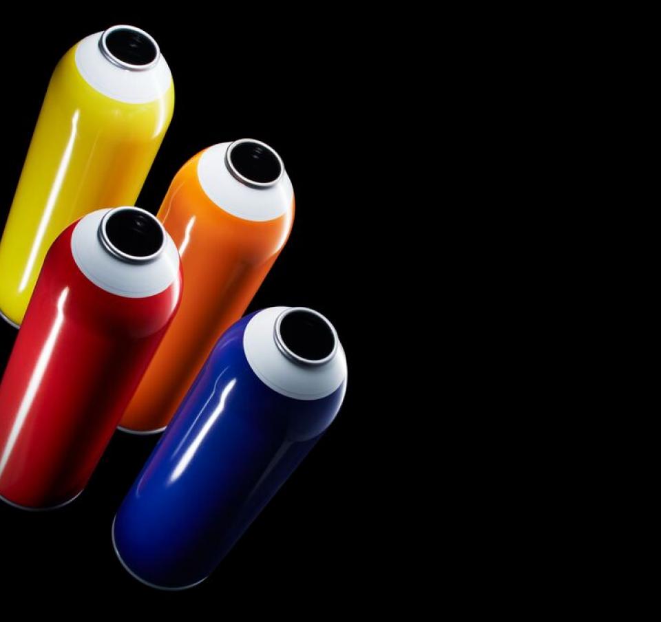 Aerosols made from Protact in four colours