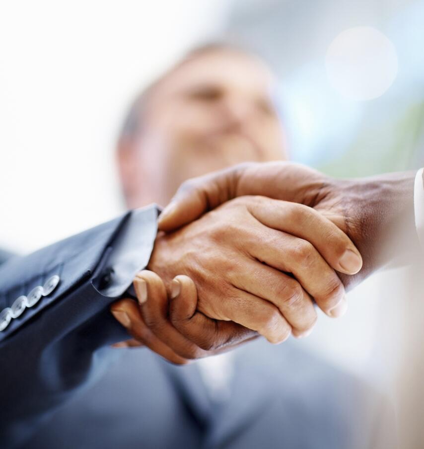 Close up of handshake between business colleagues