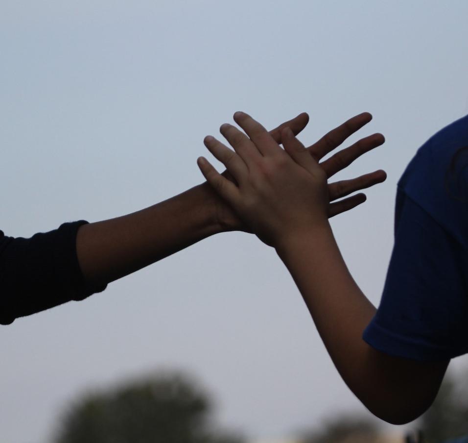 Kids shaking hands