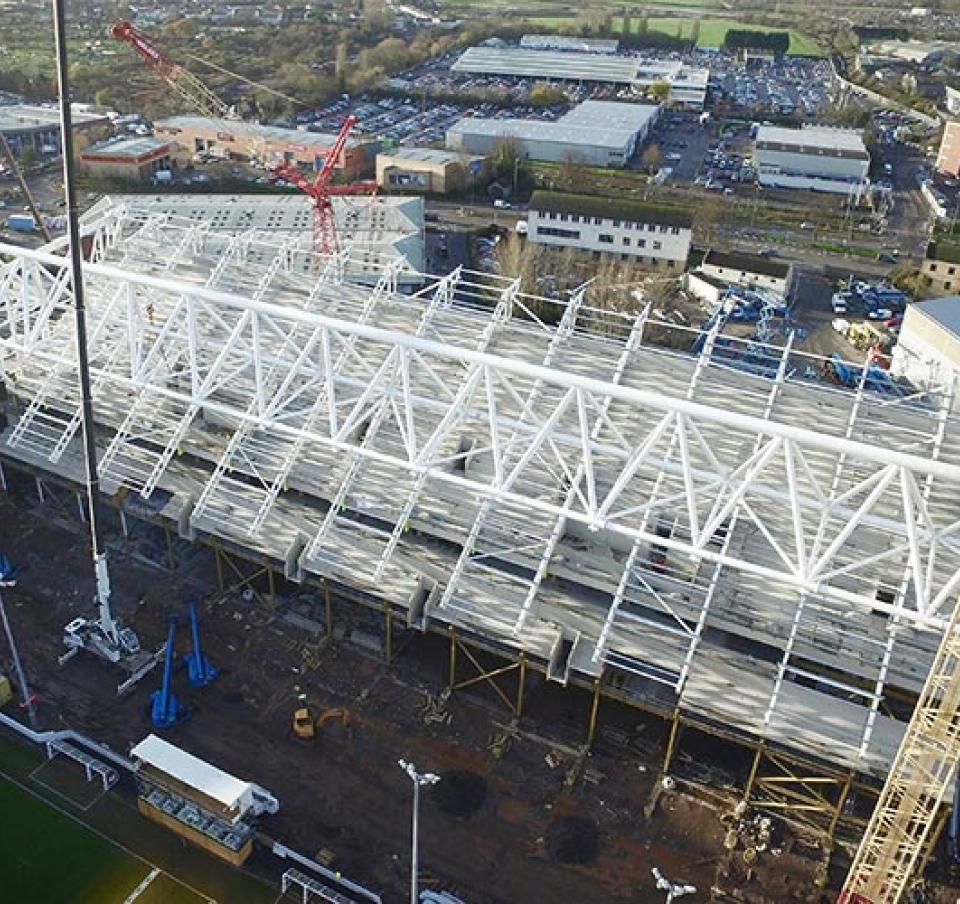 First pair of rafters being lifted